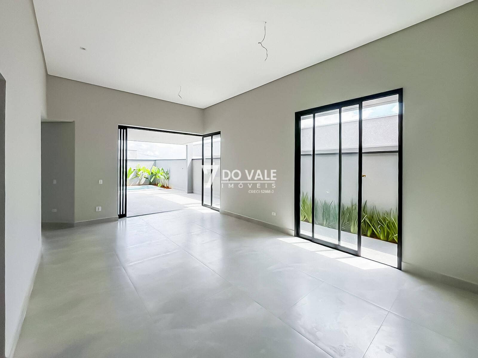 Foto 3 de Casa térrea à venda em Caçapava – Residencial Colinas | 3 suítes | Piscina